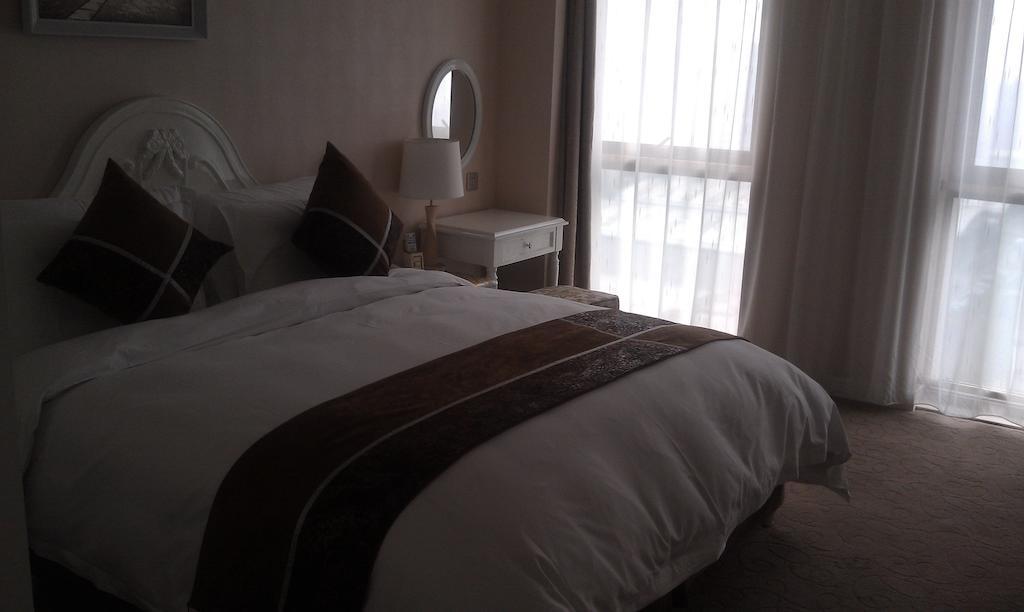 Xi'An Qu Jiang Yin Zuo Hotel Exterior foto