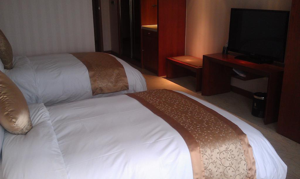 Xi'An Qu Jiang Yin Zuo Hotel Exterior foto
